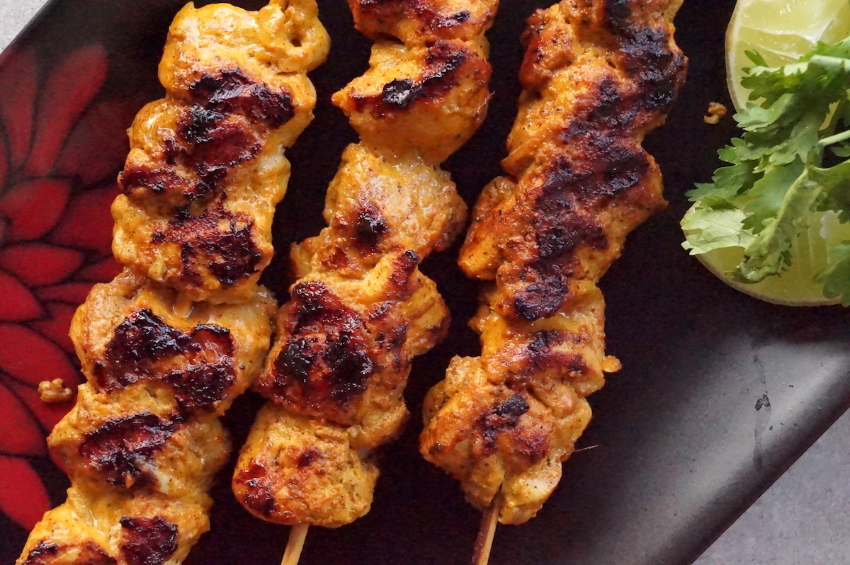 succulent chicken thighs marinated in yoghurt and spices and grilled
